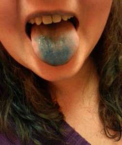 Sticking out tongue after taking methylene blue.