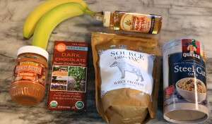 Ingredients for a peanut butter banana chocolate agave smoothie, using all-natural Source Organic Whey protein powder