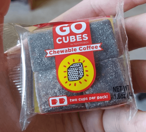 holding my new pack of go cubes from nootrobox